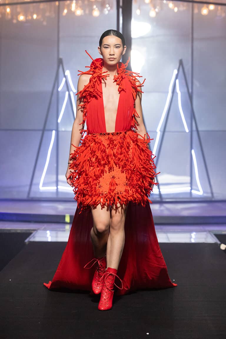 model walk on aura tout vu show wearing red embroidered silk satin and shiffon dress