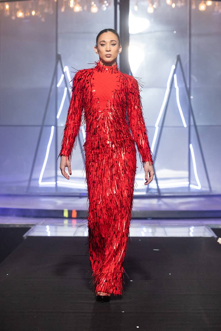 model walk on aura tout vu show wearing red embroidered fringes mesh dress